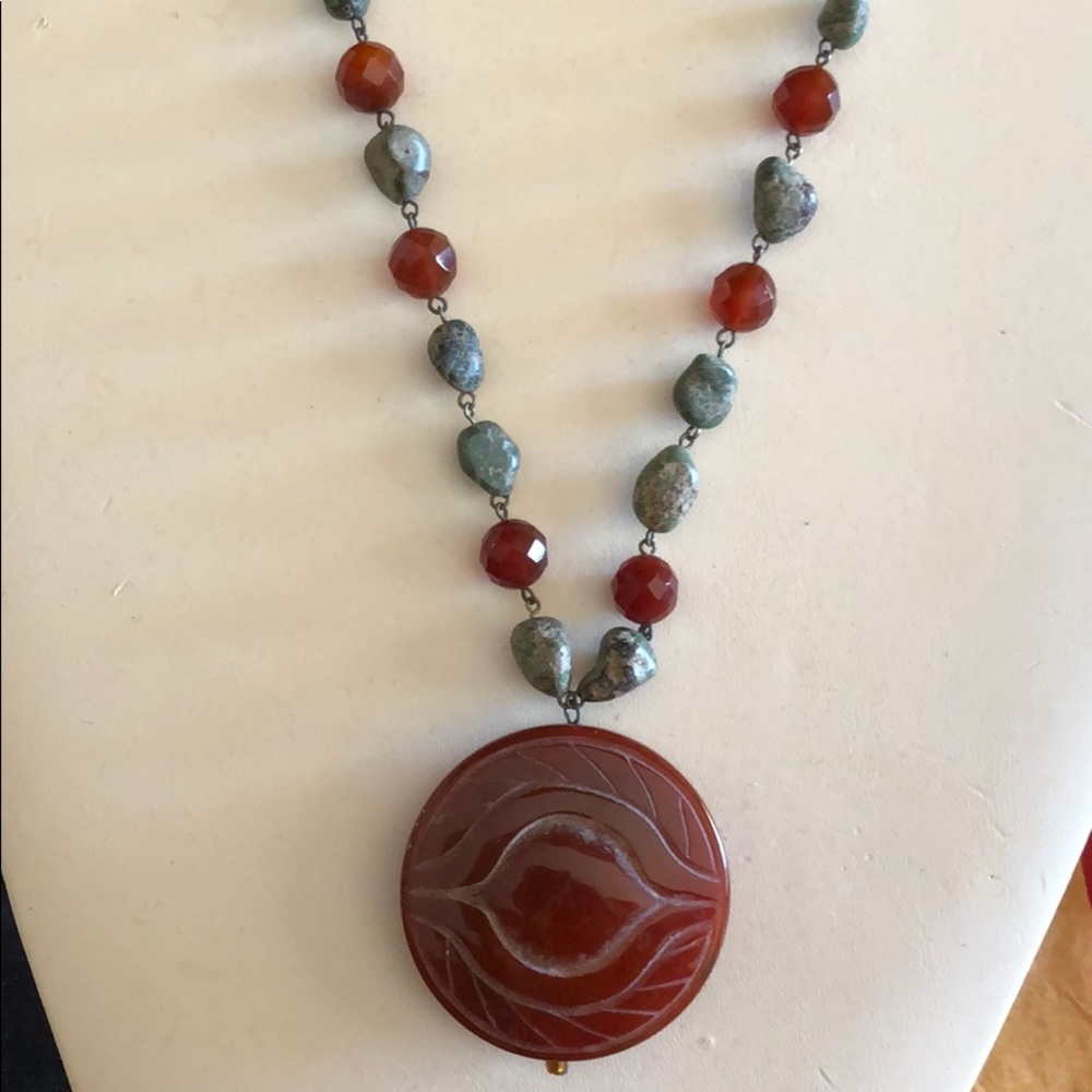 Cornelian carved genuine ,gemstones.Silver Neck.